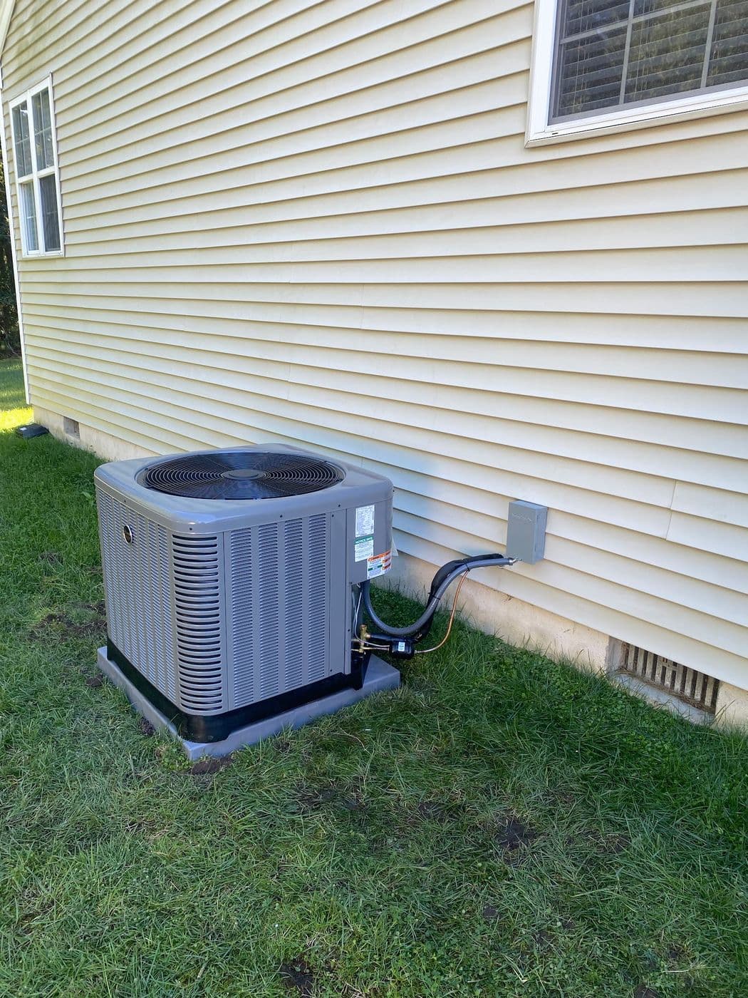A newly installed outdoor air conditioning condenser at a New Jersey home