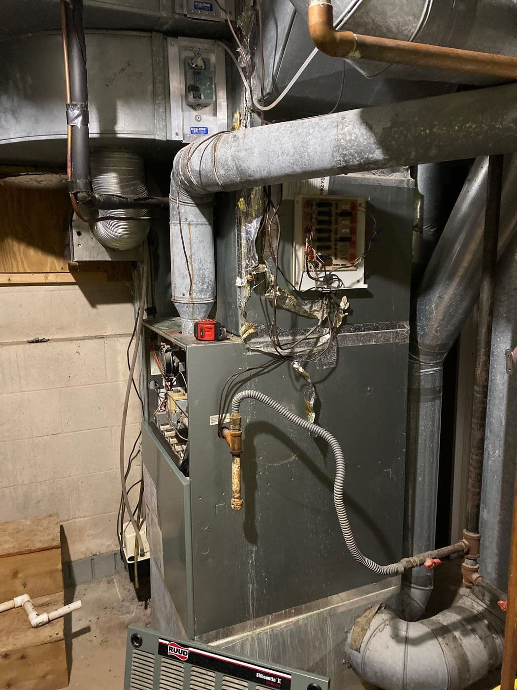 An 80 percent furnace and A/C coil before replacement