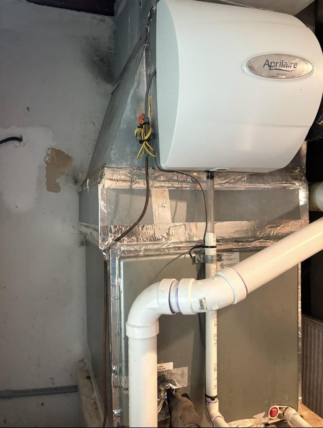 A whole house humidifier fitted to a duct run